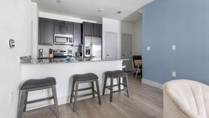 Fridge, dining tables - Landing | Chic 1BD, Gym, Pool (Austin)