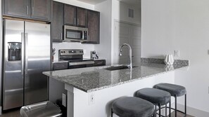 Fridge, dining tables - Landing | Stylish 2BD, Gym, Pool (Austin)