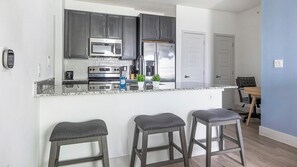 Fridge, dining tables - Landing | Spectacular 1BD, Gym, Pool (Austin)
