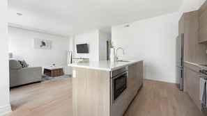 Fridge, dining tables - Landing | Chic 2BD in Logan Circle (Washington)