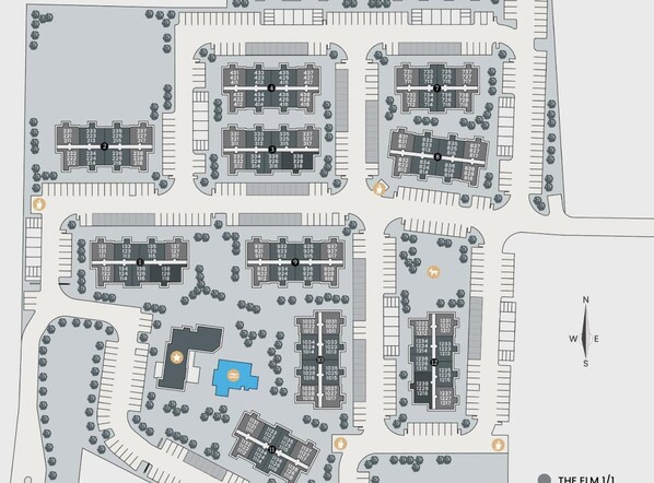 A hotel layout with multiple rectangular blocks of rooms, arranged in a grid pattern. - Landing | Beautiful 1BD, Gym (Denton)