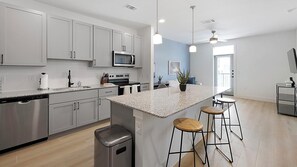 Fridge, dining tables - Landing | Modern 1BD, Gym (Denton)