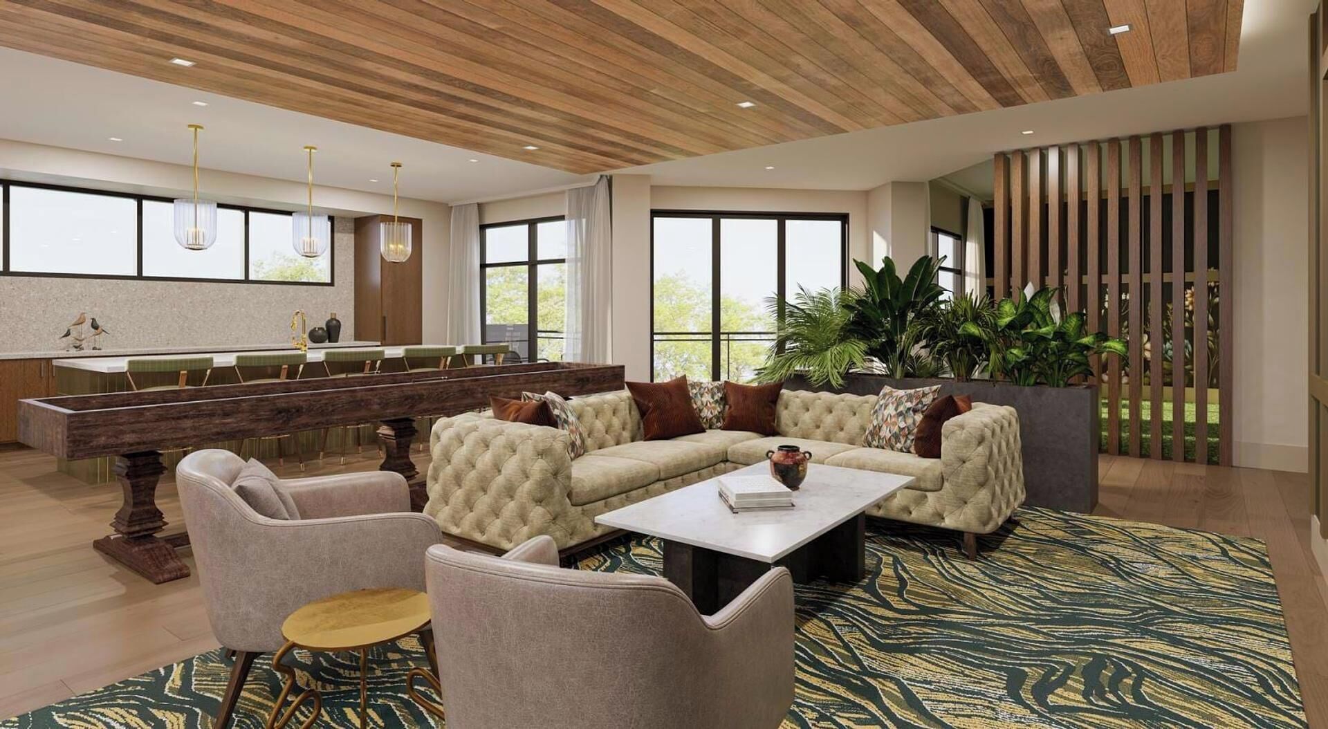 A spacious lounge area with a long bench, sofas, and a coffee table.