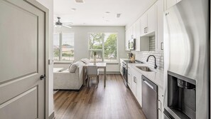 Fridge, dining tables - Landing | Incredible 1BD, Courtyard, Gym (Nashville)