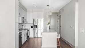 Fridge, dining tables - Landing | Incredible 1BD, Courtyard, Yoga Studio (Nashville)