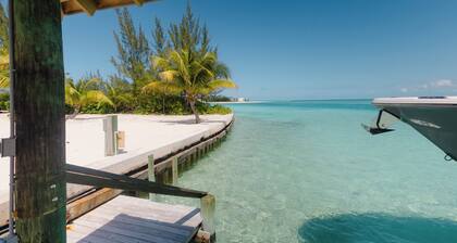 Tranquil 4-bedroom 3-bath house with 50' boat dock in delightful Treasure Cay