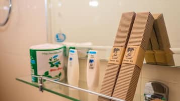 Deluxe Double Room, Balcony, River View | Bathroom amenities | Shower, free toiletries, hair dryer, towels