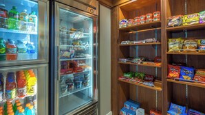 A vending machine area with snacks and drinks.