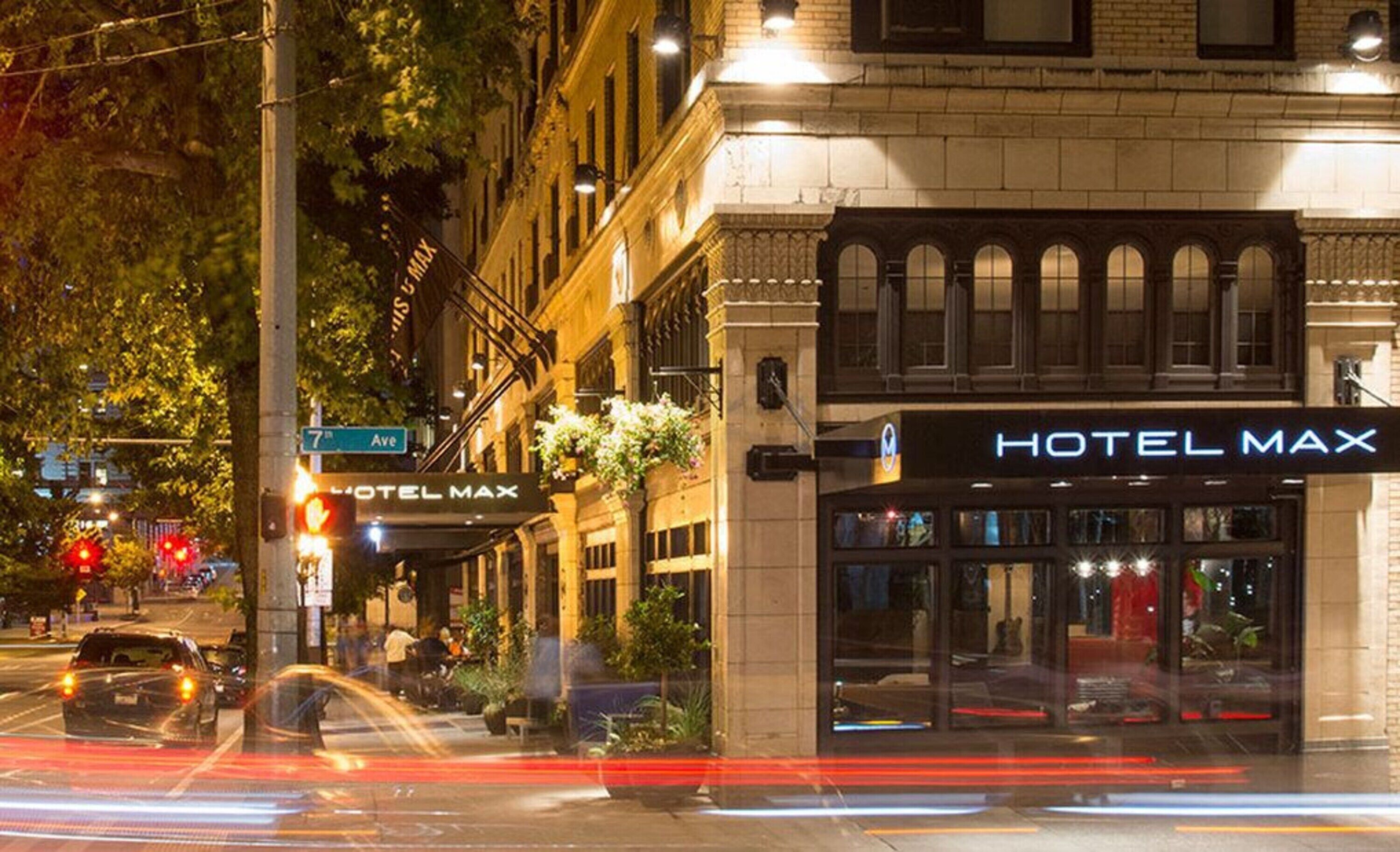 A building with a 'HOTEL MAX' sign, located at 7th Ave.