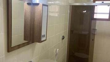 Standard Suite | Bathroom | Shower, towels, soap, toilet paper
