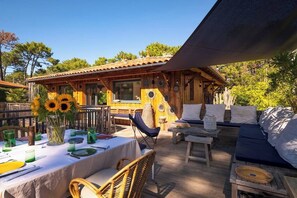 Outdoor dining - Villa premium 10 pers • Piscine chauffée • Cœur Cap‑Ferret (Lège-Cap-Ferret)