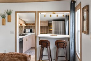 Fridge, microwave, oven, stovetop - Downtown Sioux Falls Shacks l The Lumber House (Sioux Falls)