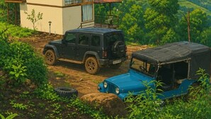 A two-story house with a vehicle parked in front. - Adventure trails (Kodaikanal)
