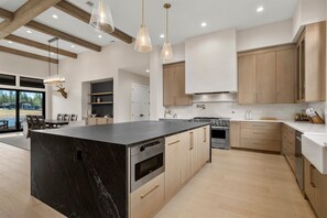 Fridge, microwave, oven, stovetop - Brand-New Lakefront Estate | Private Lake + Hot Tub | Outdoor Living (Bend)