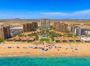 On the beach, sun loungers, beach towels