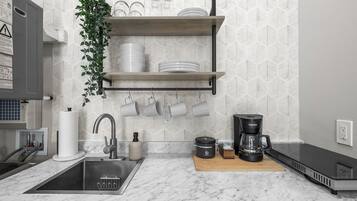 Coffee/tea maker, microwave, stovetop, cookware/dishes/utensils
