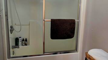Hair dryer, towels, soap, shampoo