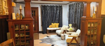 Whimsical cottage next to beautiful park setting