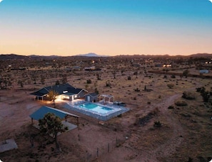 Awesome side dusk view of house and yard