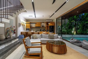 Luxury Villa, Pool View | Living area | 50-inch Smart TV with digital channels - Seis Villas - Luxury Tropical Retreat (Badung Regency)