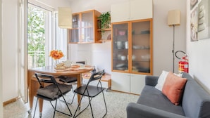 A compact living space with a dining area, kitchenette, and seating area. - Apartment in Fano with 2 bedrooms sleeps 5 (Fano)