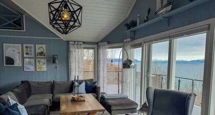 Cottage with northern lights near Stetinden