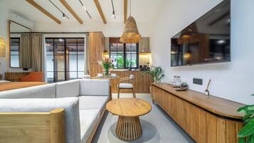 Classic Apartment, Patio, Courtyard View | Living area | 50-inch Smart TV with digital channels