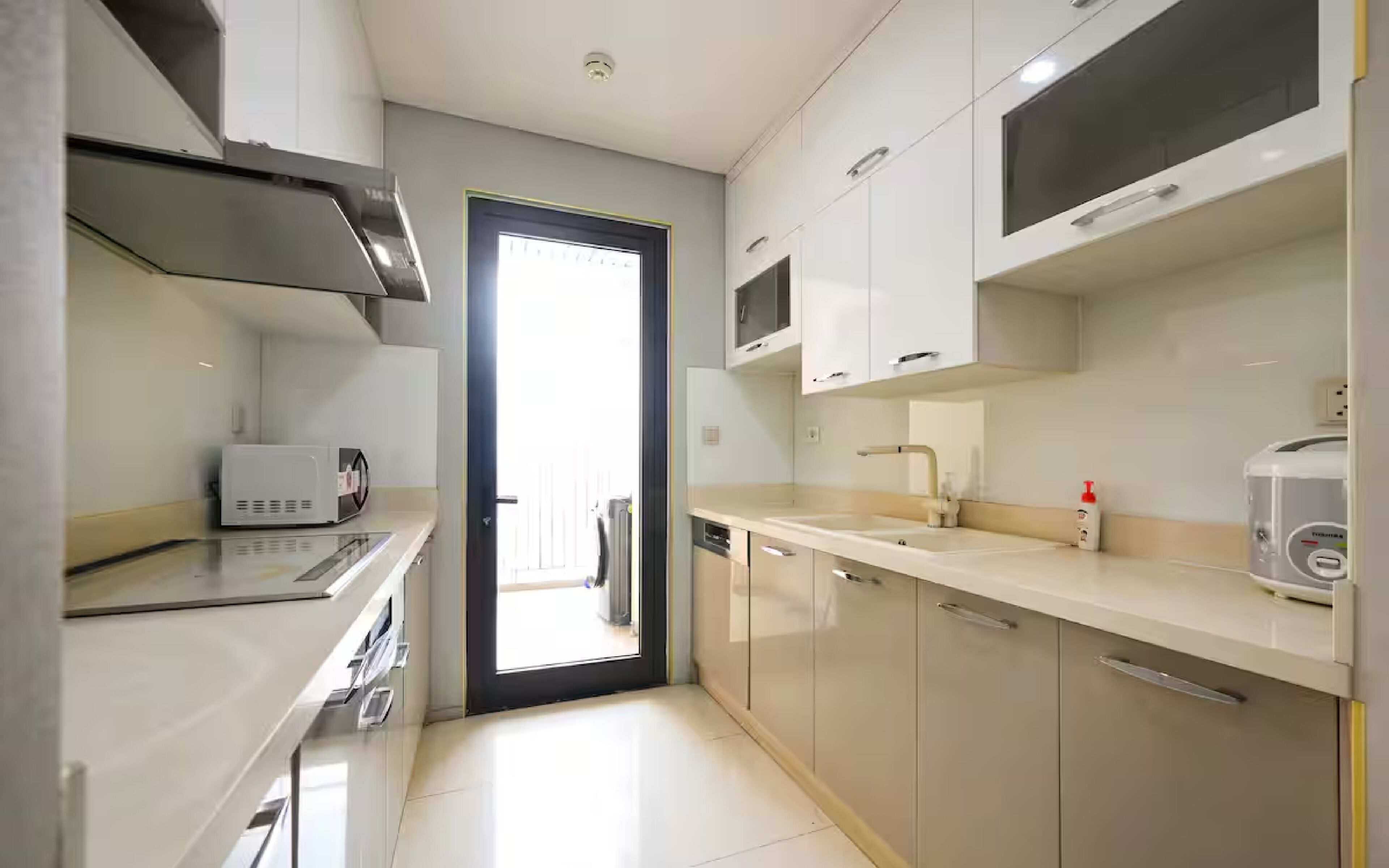 Full-size fridge, microwave, stovetop, cookware/dishes/utensils