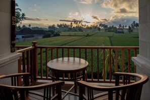 Deluxe Room, Garden View | Terrace/patio