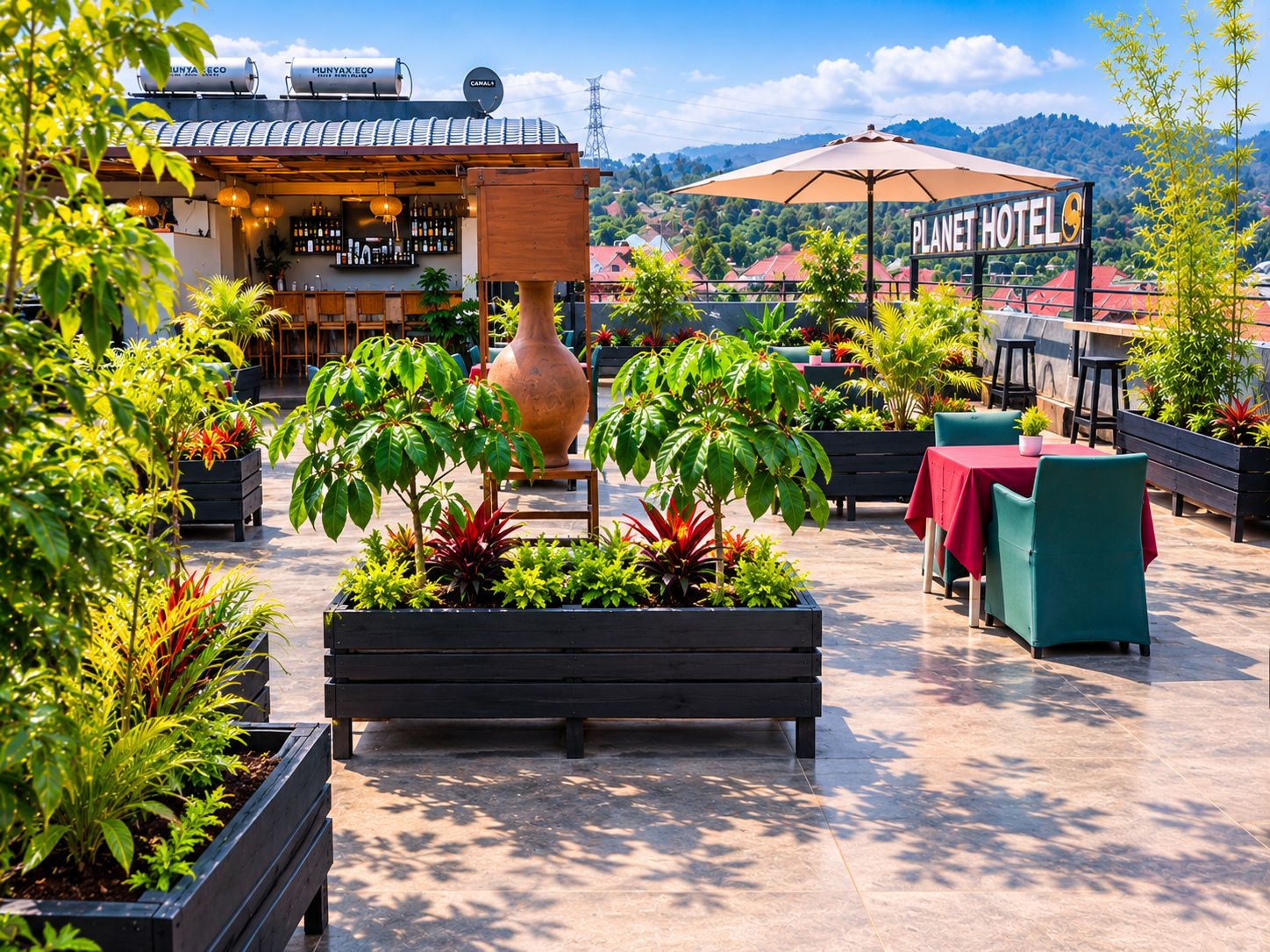 An outdoor patio area with a bar, seating, and a sign for the Planet Hotel.