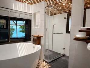 Deluxe Bungalow, Balcony, Sea View | Bathroom | Shower, free toiletries, hair dryer, bidet