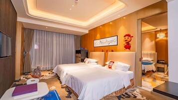 Family Quadruple Room, City View | In-room safe, soundproofing, iron/ironing board, free WiFi