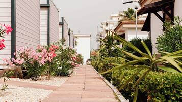 Casa Deluxe, 2 habitaciones, patio, junto a la alberca | Áreas de la propiedad