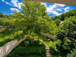Habitación doble superior, vistas al jardín | Jardines del alojamiento