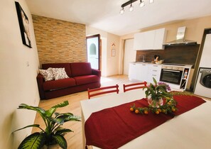 A modern kitchen with white cabinets, a built-in oven, and a microwave. -  NEW! Perfect for 2! Private Pool, mountain Views, covered terrace. Romance! (Toscana)