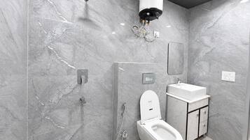 Deluxe Double Room, City View | Bathroom | Shower, free toiletries, towels, soap