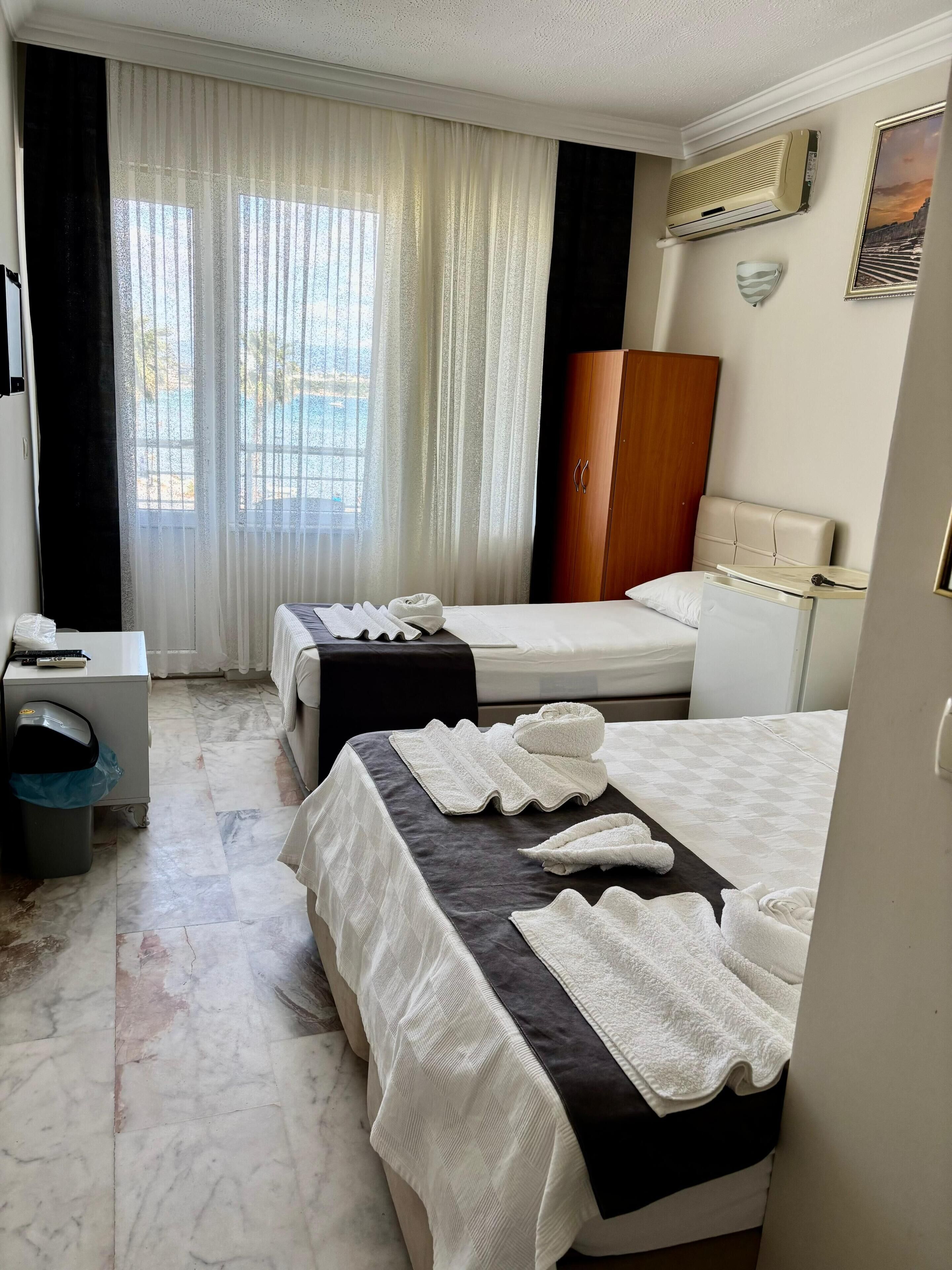 Economy Triple Room, Balcony, Beach View