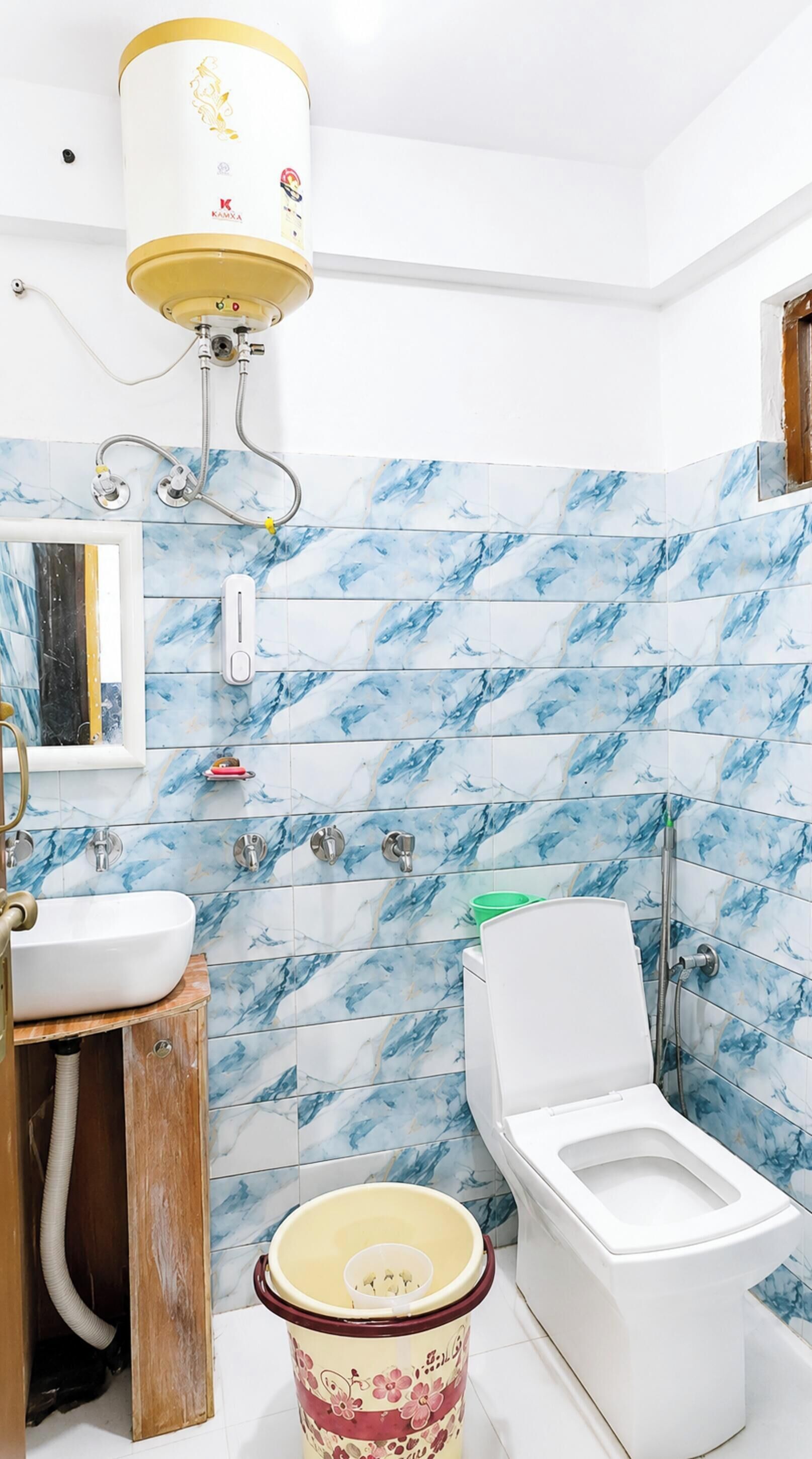 Shower, rainfall showerhead, slippers, towels