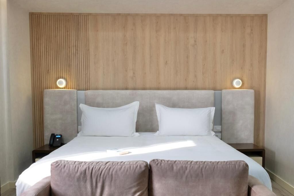 Deluxe Double Room, Balcony, Partial Sea View | In-room safe, iron/ironing board, free WiFi, wheelchair access