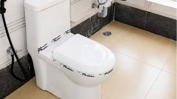 Shower, rainfall showerhead, slippers, towels