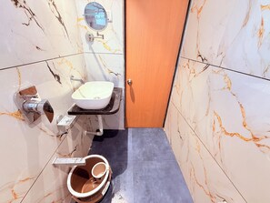 Deluxe Room | Bathroom | Shower, towels, soap, shampoo - Radhe Residency MIDC Taloja  (Mumbai)