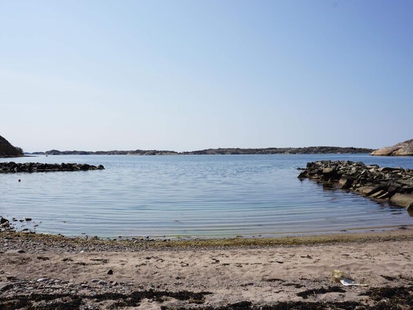 A calm body of water with rocky shores and distant landforms. - 4 Star Holiday Home in Tanumshede (Tanum)