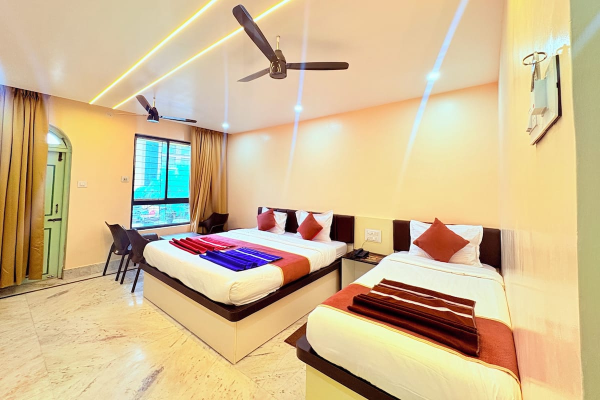 Premium Triple Room, City View | Desk, free WiFi