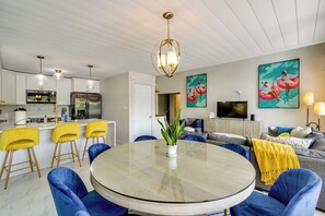 A modern kitchen with white cabinets, a stainless steel refrigerator, and a built-in oven. - Lakefront Bliss w/ Dock + Fire Pit! Ozarks Home (Osage Beach)