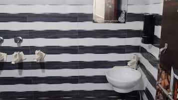 Ducha, artículos de tocador gratuitos, toallas