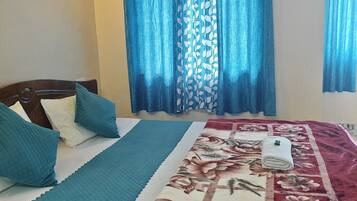 Family Room, Balcony, Mountain View | Free WiFi, bed sheets