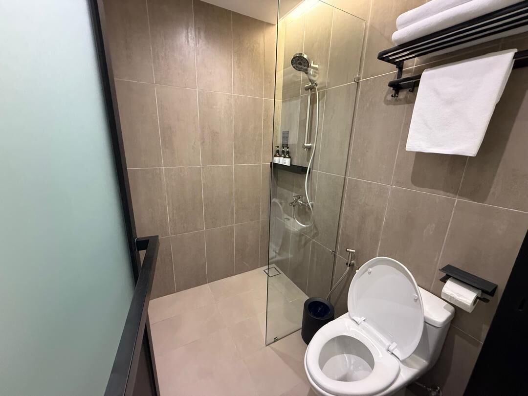 Hair dryer, slippers, towels, shampoo