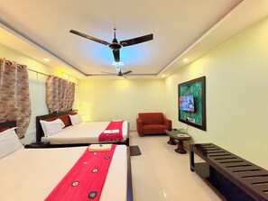 Deluxe Quadruple Room, City View | Desk, free WiFi - The Bj (Puri)