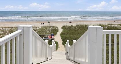 Colony By The Sea Condo 2BR/2BA with ocean views, direct beach access, community pool, hot tub, elevator & private balcony. Enjoy a king ensuite & guest room with bunk bed and full size guest bed. TV's in each room, full kitchen, washer/dryer.