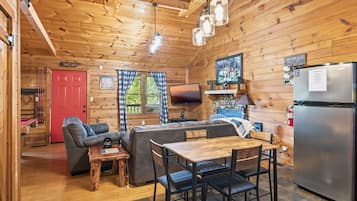 Cabana, 1 quarto | Área de estar | Smart TV